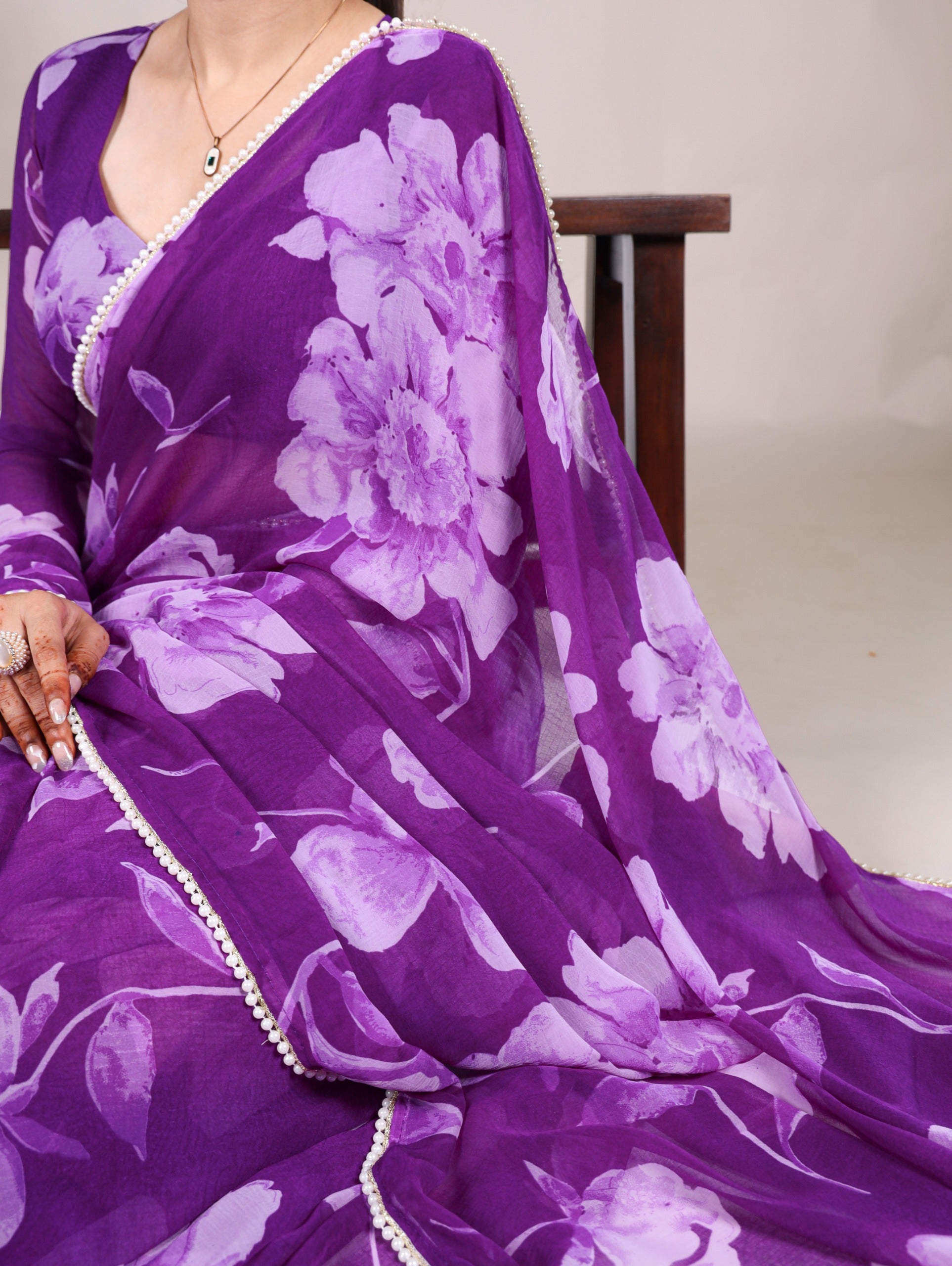 Delicate blooms, pearl border Saree