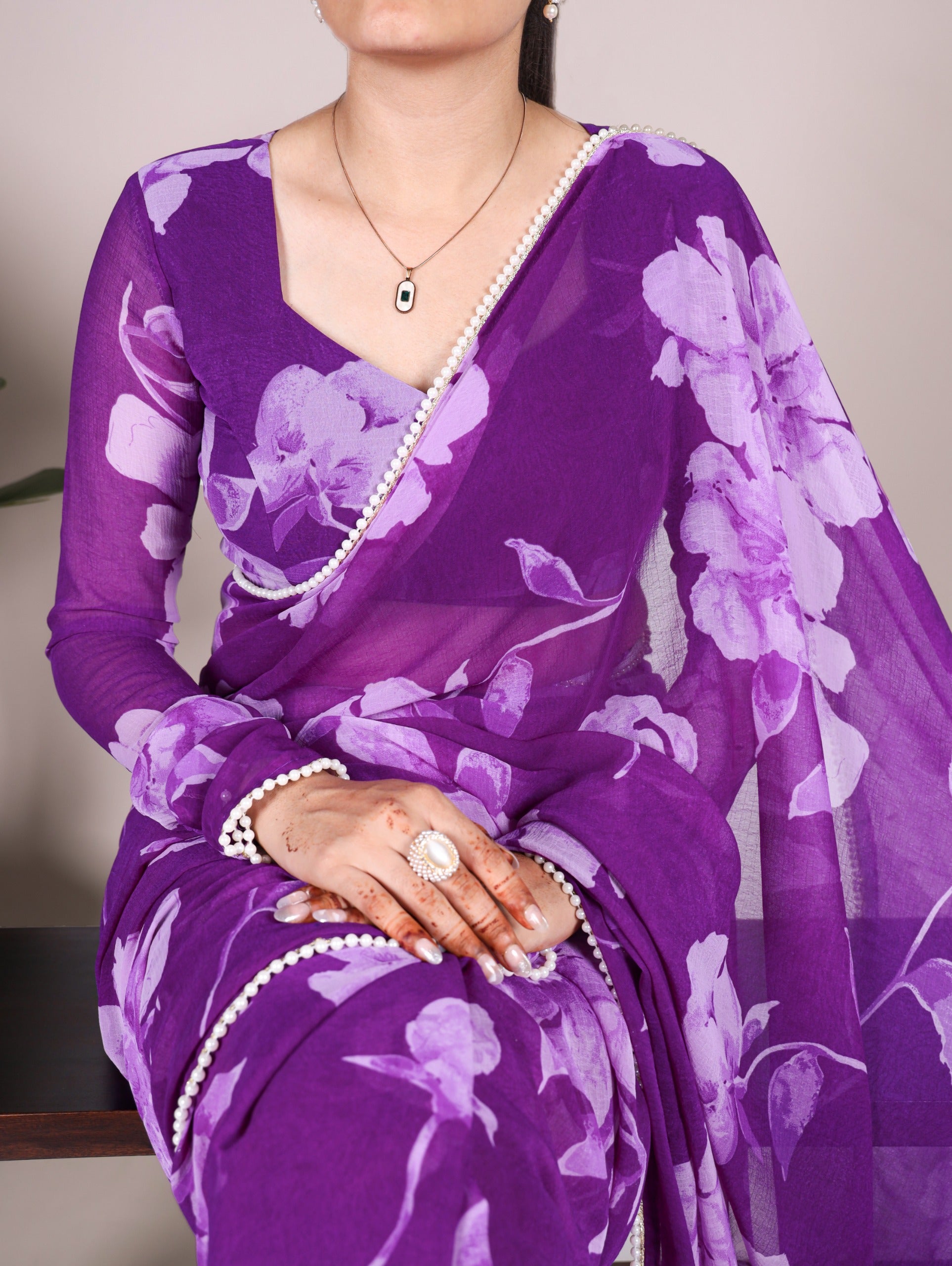 Delicate blooms, pearl border Saree