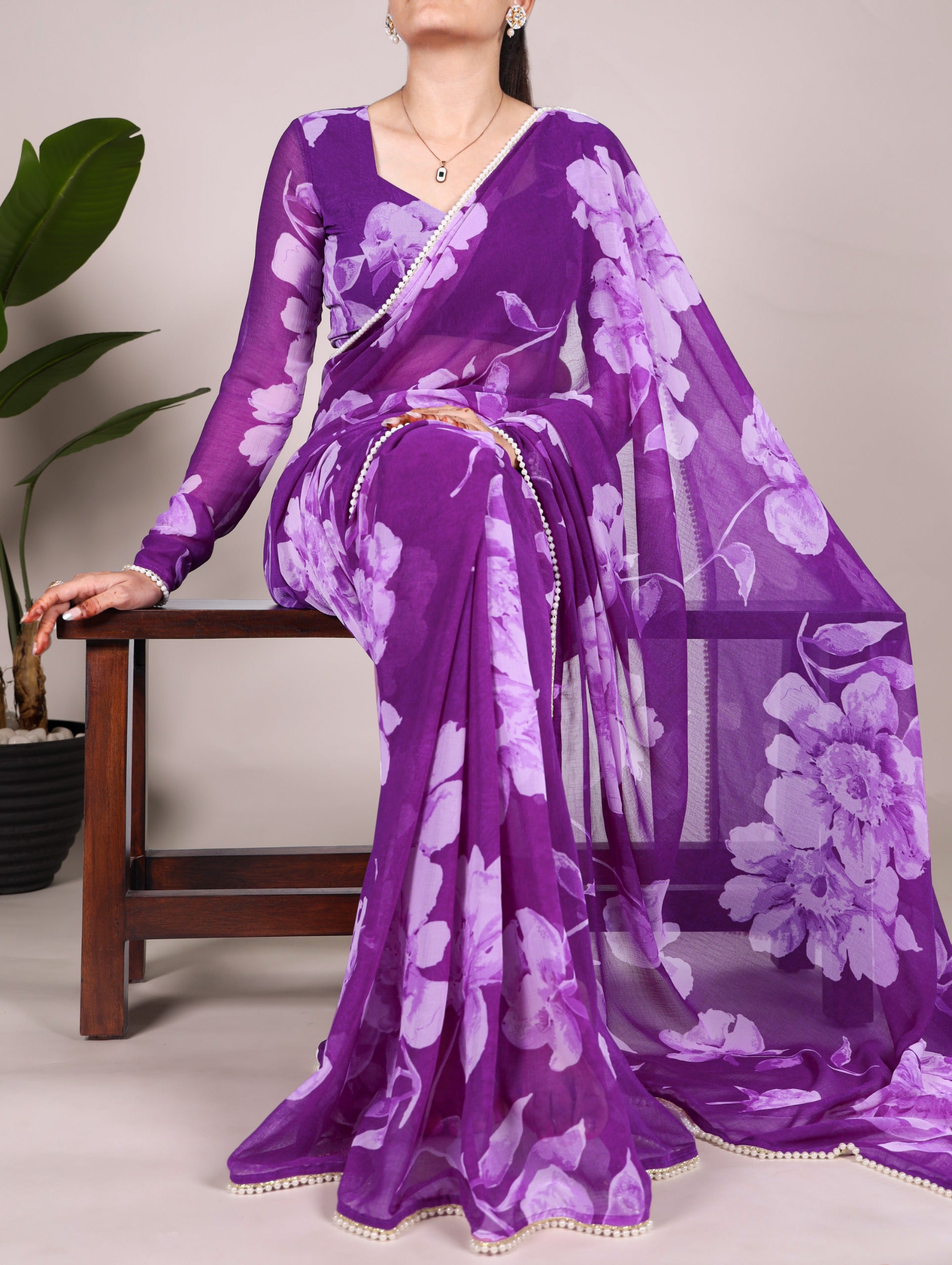 Delicate blooms, pearl border Saree
