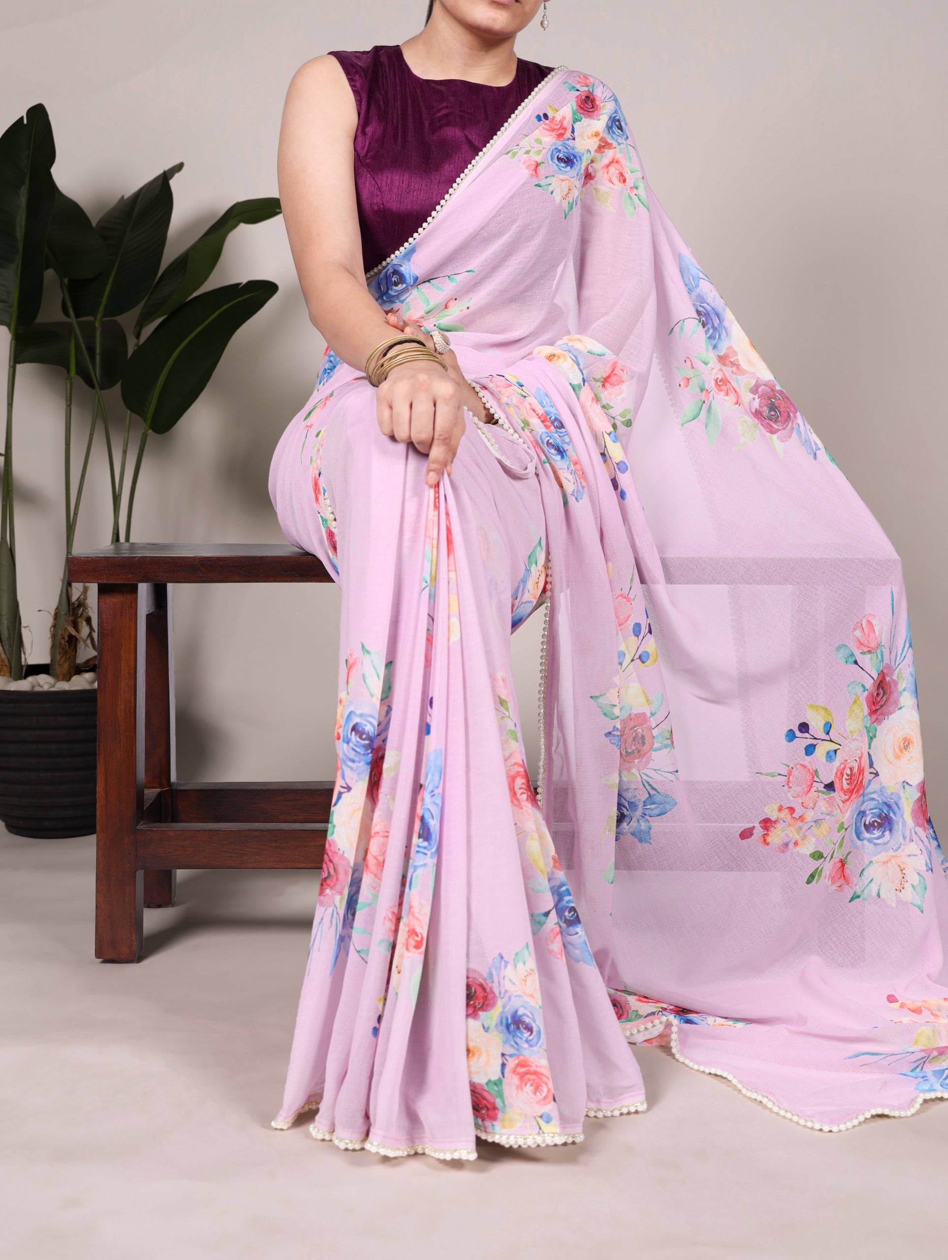 Weightless charm, pearled grace Saree