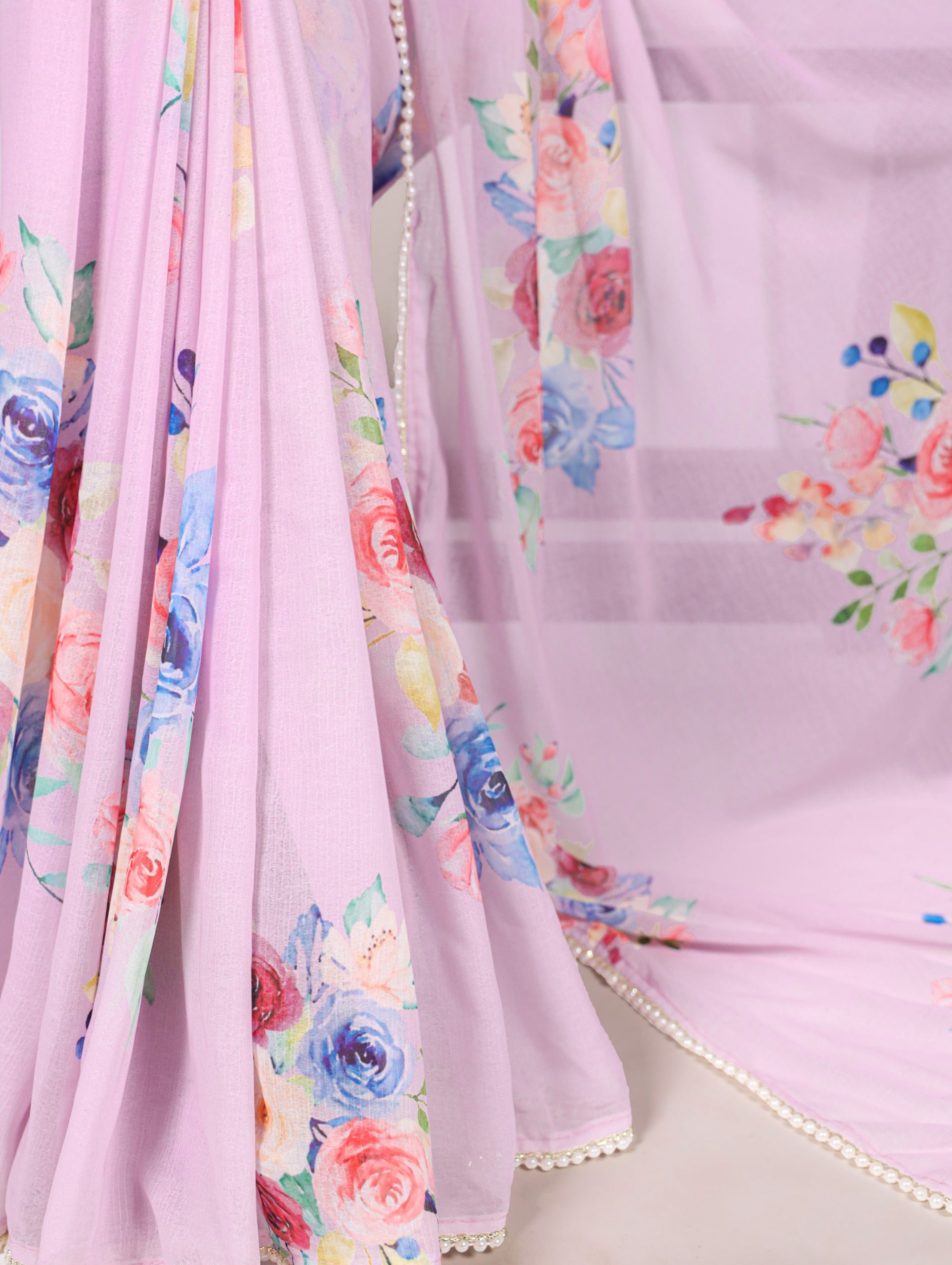 Weightless charm, pearled grace Saree
