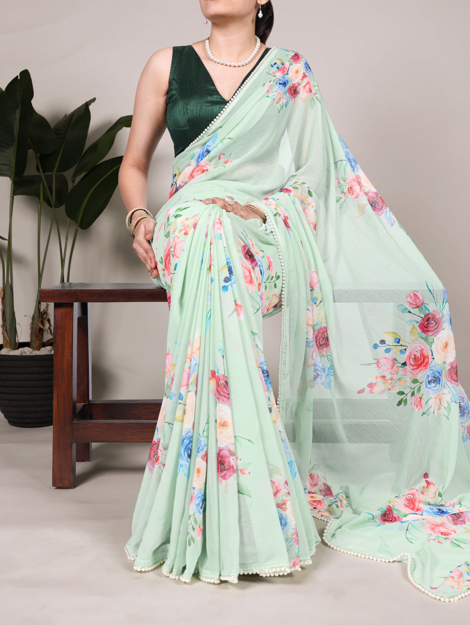 Weightless charm, pearled grace Saree