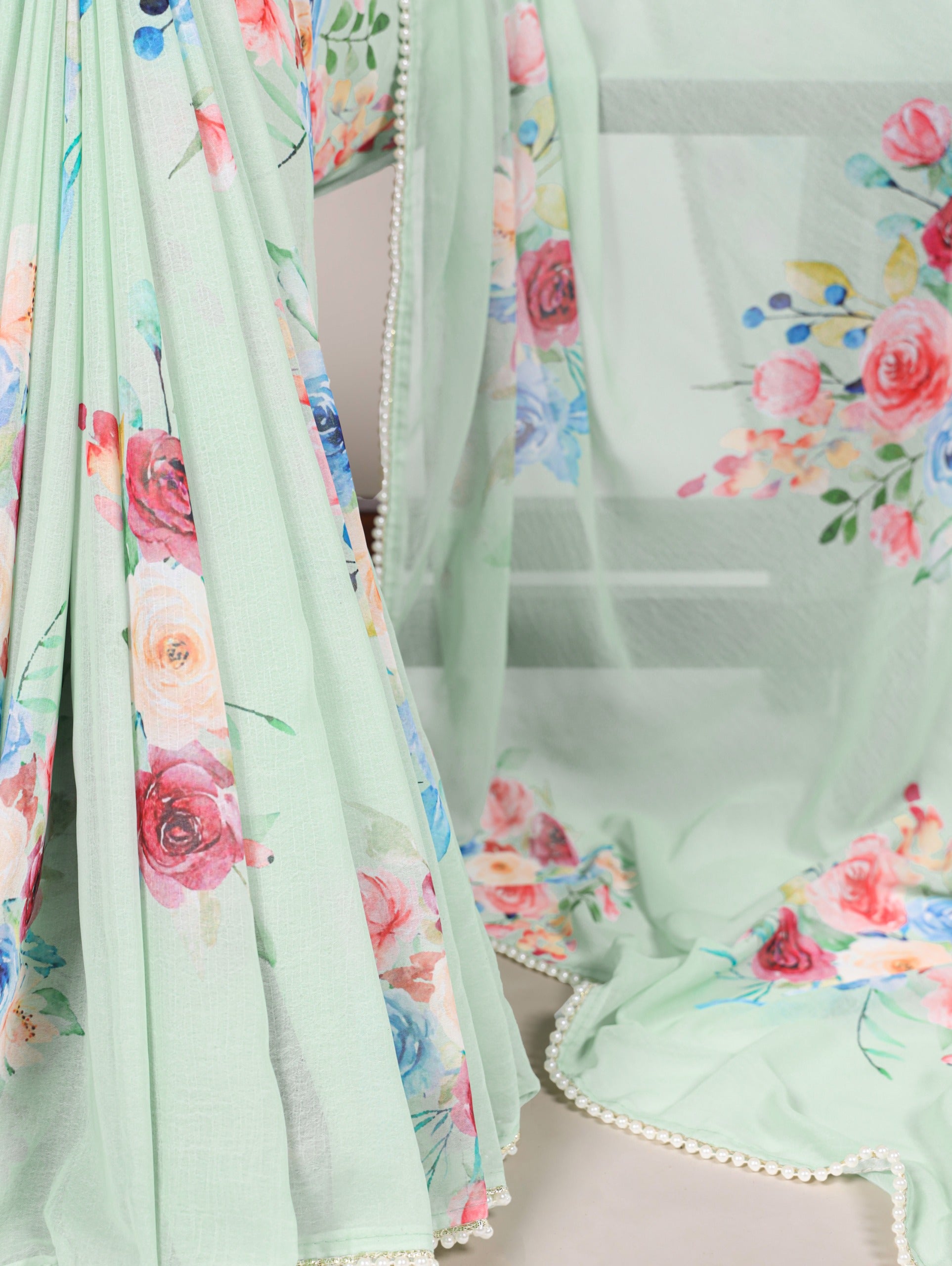 Weightless charm, pearled grace Saree