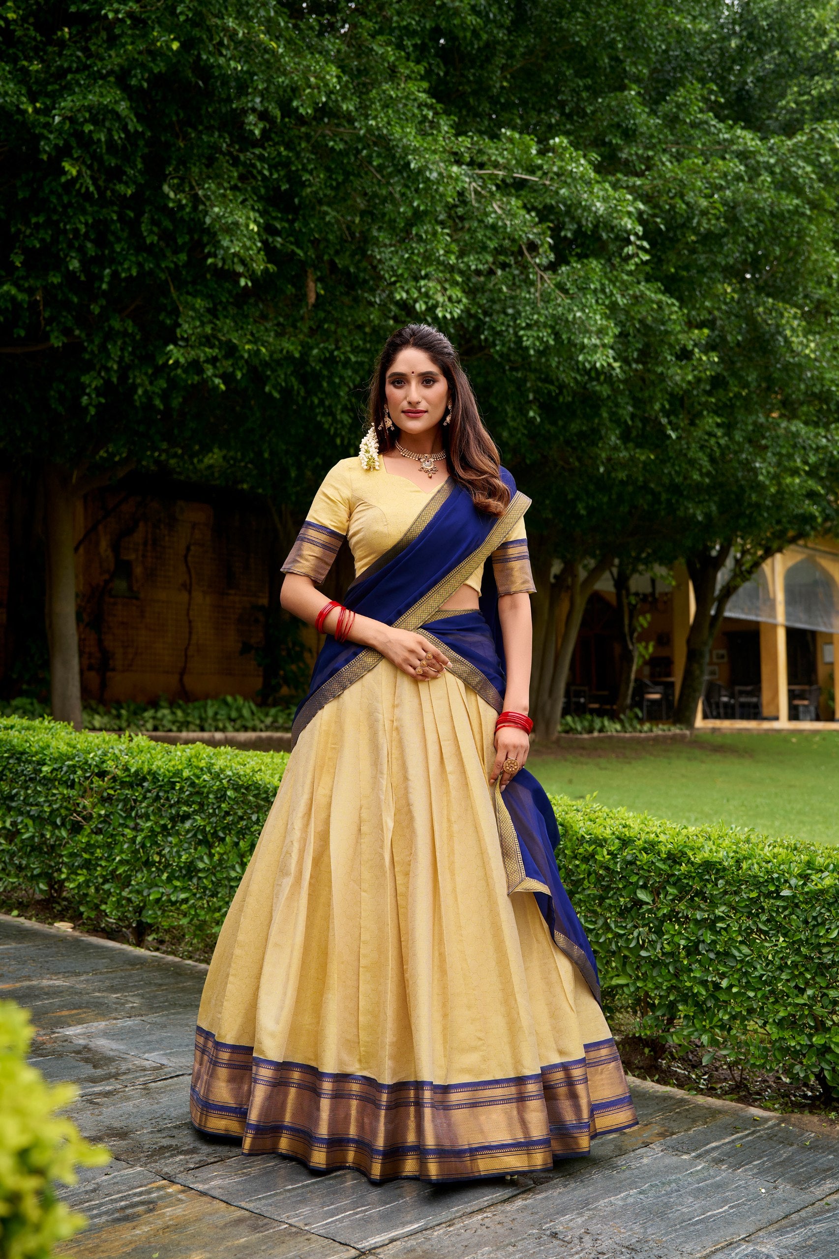 The golden charm of zari, the grace of Kanchipuram — a half saree