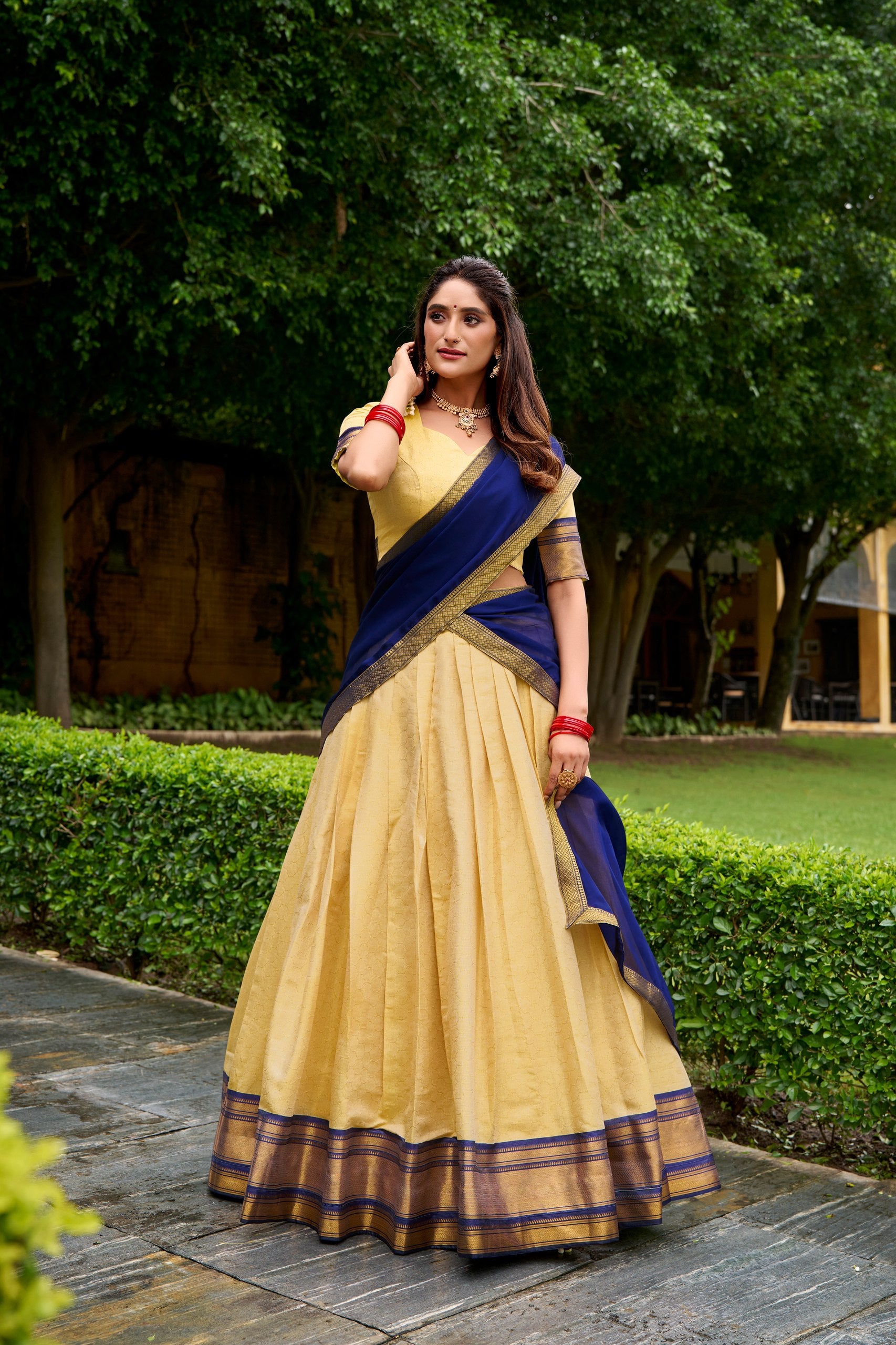 The golden charm of zari, the grace of Kanchipuram — a half saree