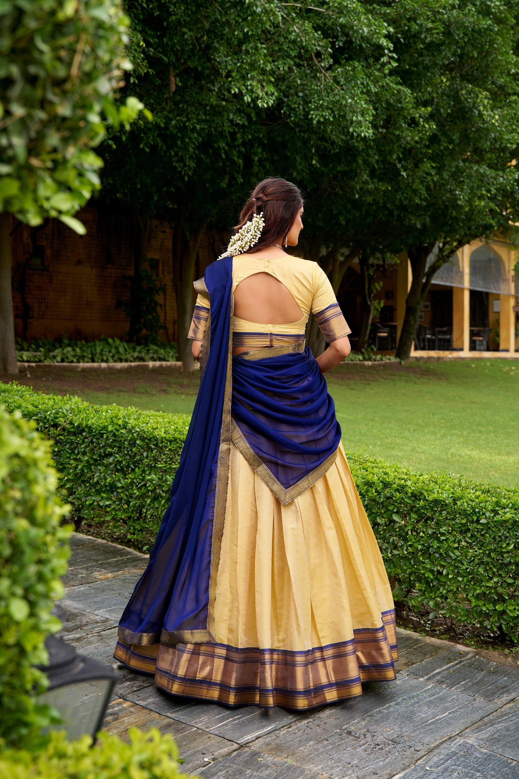 The golden charm of zari, the grace of Kanchipuram — a half saree